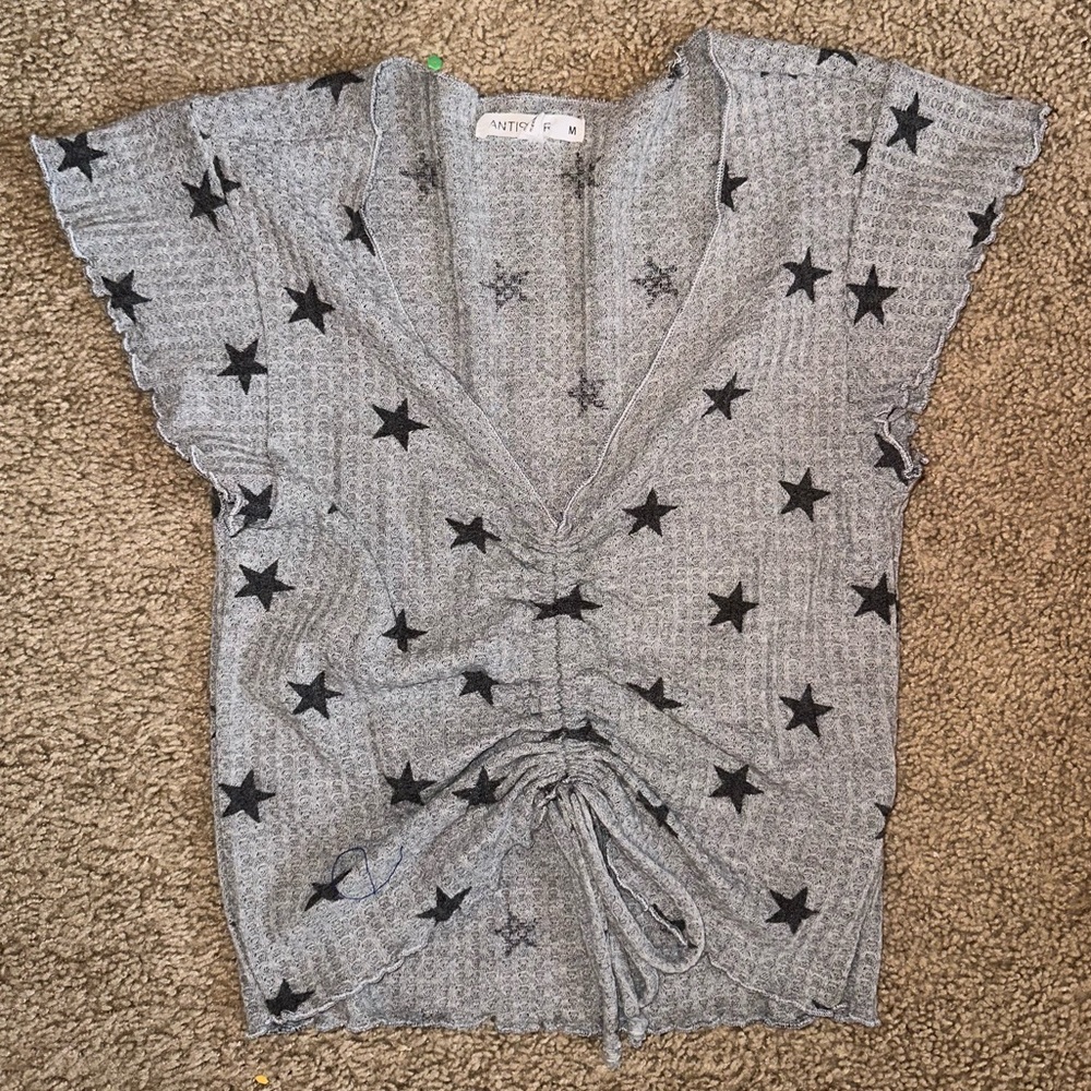 ANTISTAR light grey top with dark charcoal grey stars
